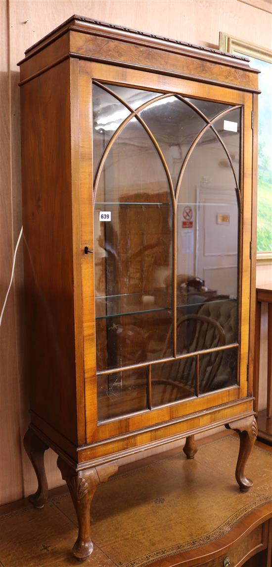 A 1950s walnut display cabinet, W.65cm H.132cm